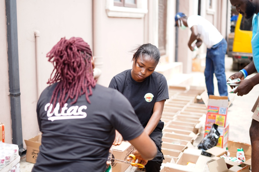 Volunteers preparing and packaging supplies